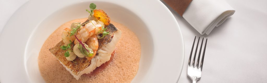 Elegant dish of fish with King prawns